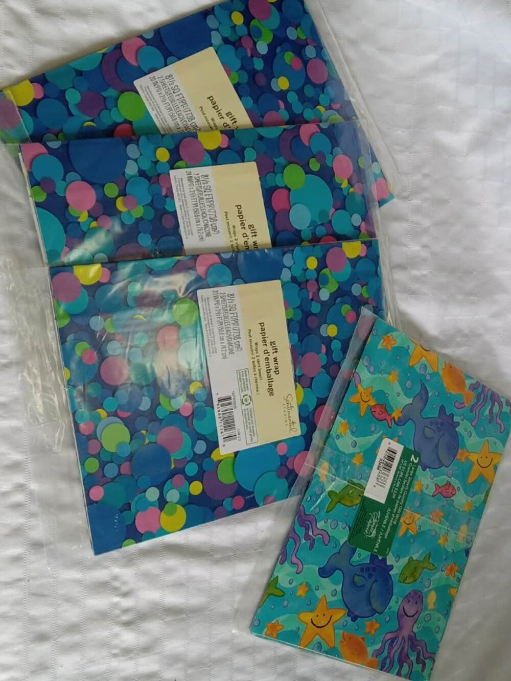 4 old but new vintage gift wrap papers sets in their plastic